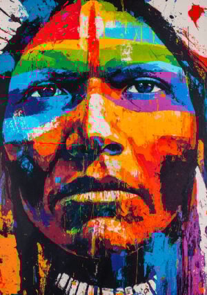Portrait coloré style street art d’un chef amérindien – œuvre artistique peinte avec le pochoir Visage Indien. Expressif, moderne et percutant.